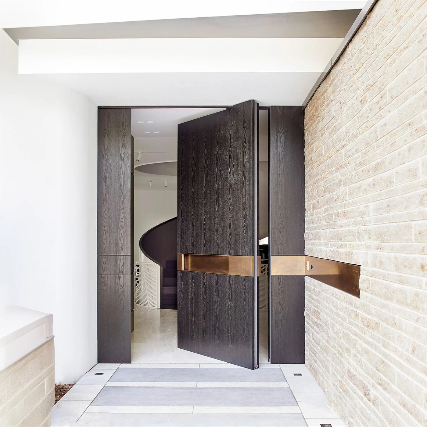 Mixed-finish pivot door design reference 0056 from the AsvntDoor design library
