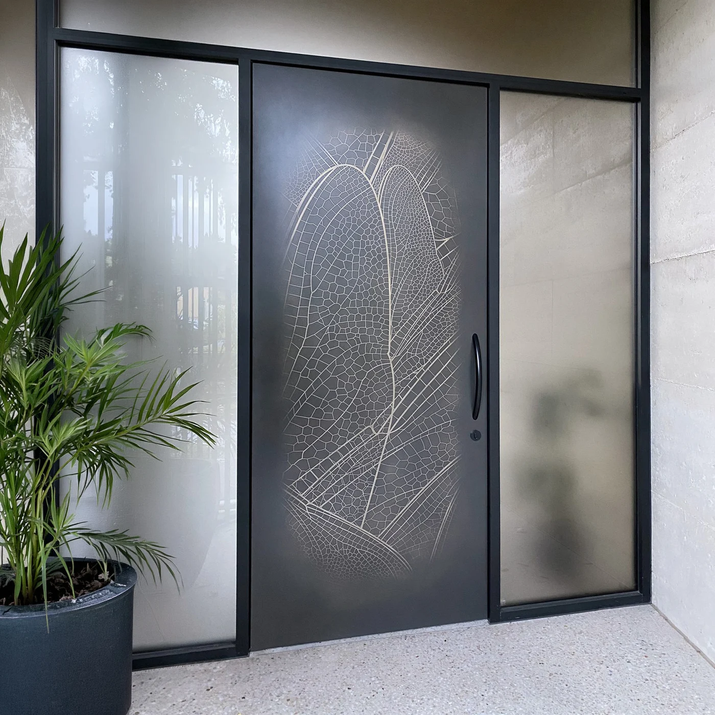 Patterned pivot door design reference 0084 from the AsvntDoor design library