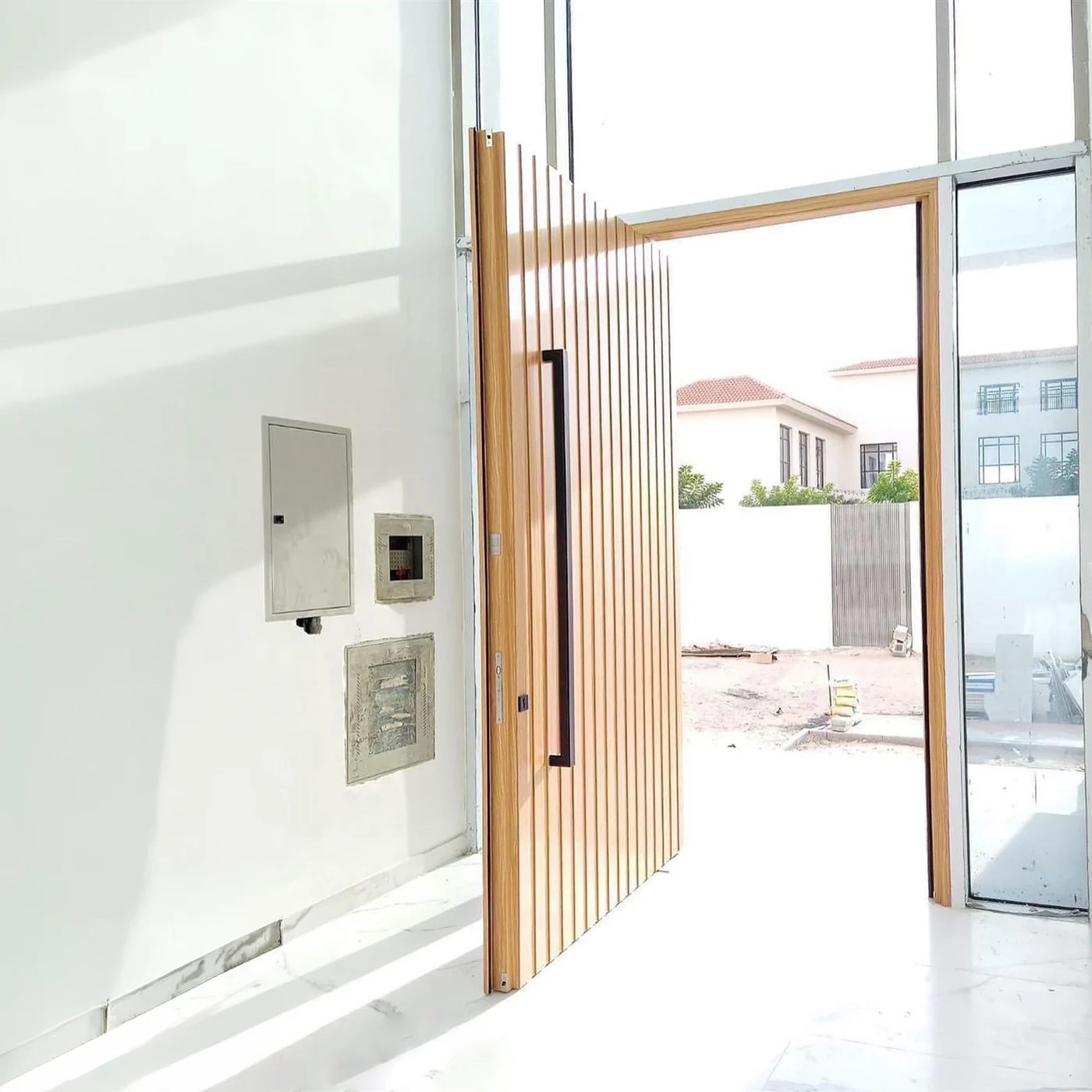 Wood-grain pivot door design reference 0099 from the AsvntDoor design library