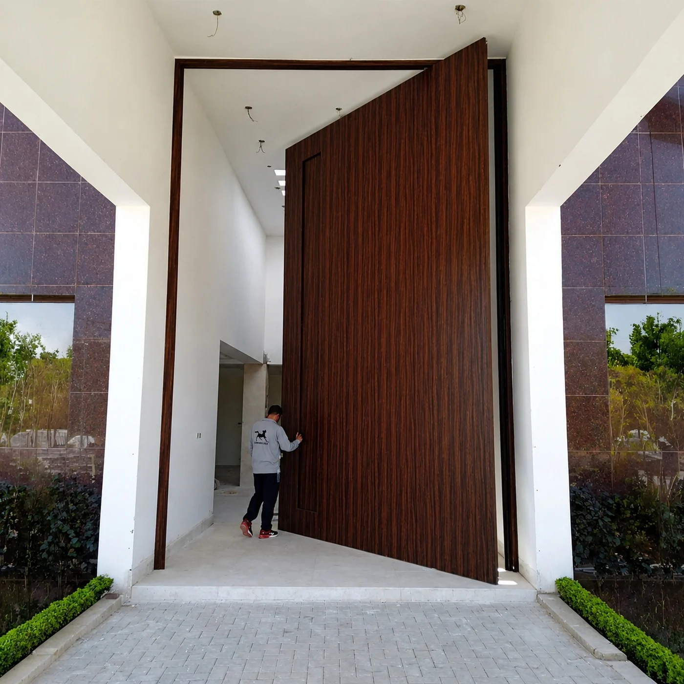 Wood-grain pivot door design reference 0105 from the AsvntDoor design library